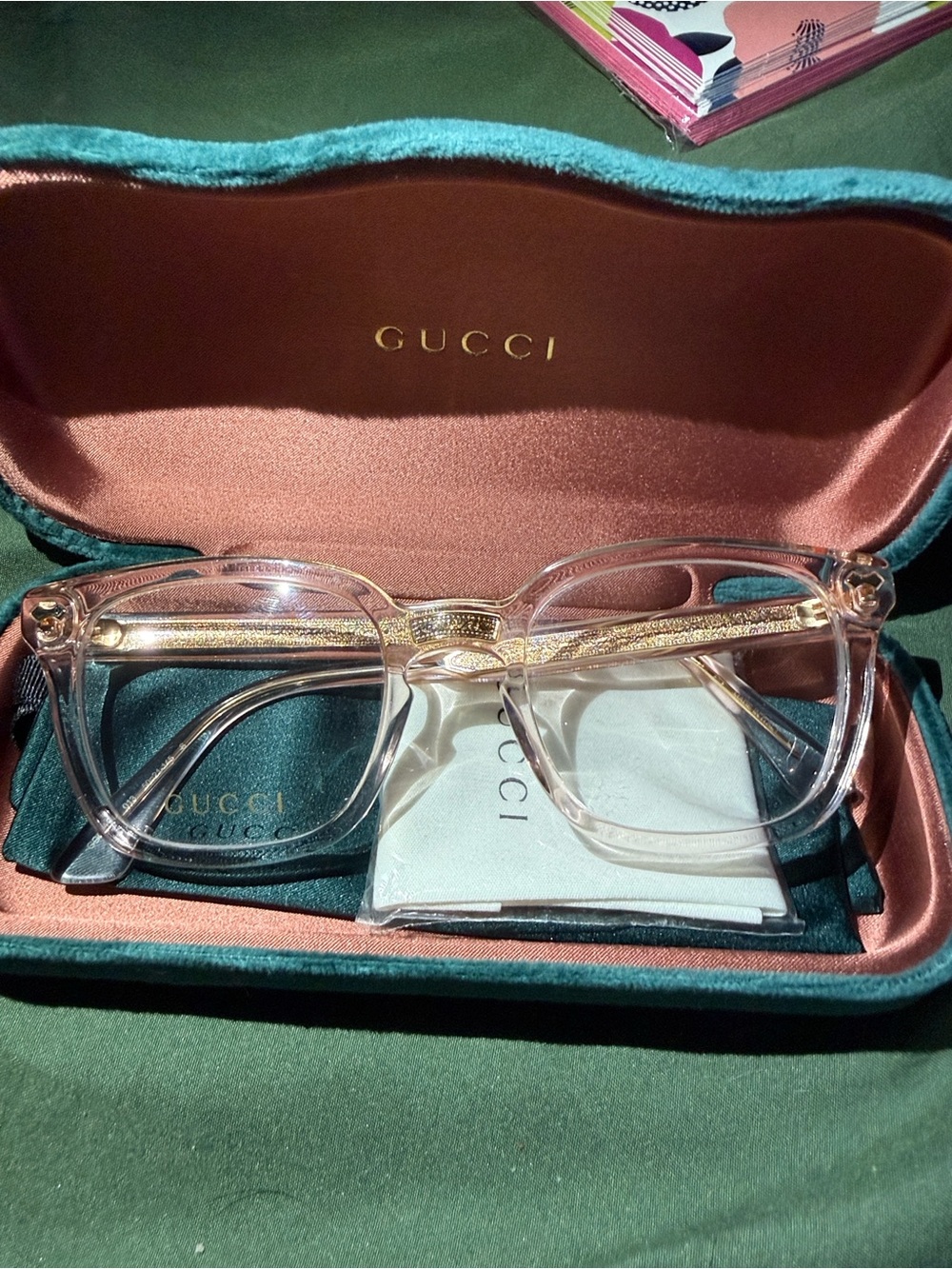 Gucci Pink Transparent Frame Glasses with Gold Detailing